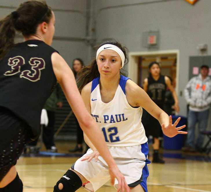 St. Paul's Diana Hernandez (12) guards Damascus Christian's Emily Powers (33). (NW Sports Photography)