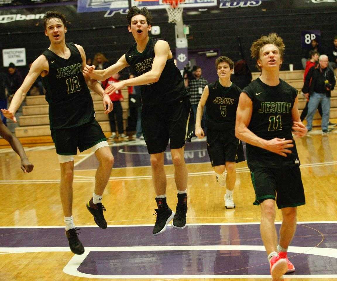 Jesuit players celebrate after defeating Lake Oswego in a 6A semifinal Friday. (Photo by Norm Maves Jr.)