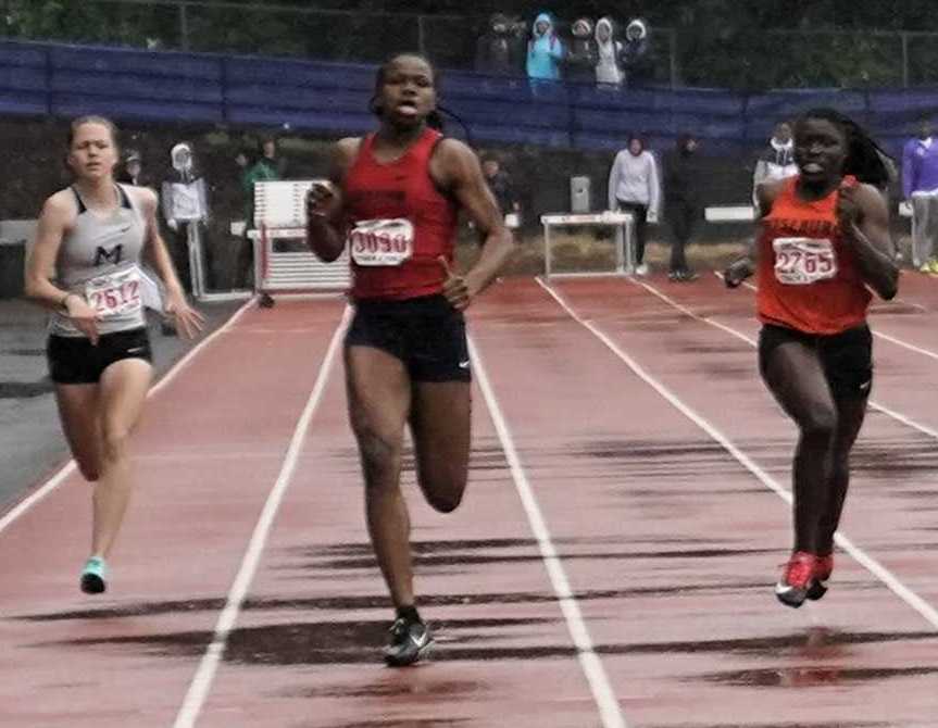 Westview's Colleen Ozoekwe won the 100, 200 and long jump and was second in the high jump. (Photo by Jon Olson)