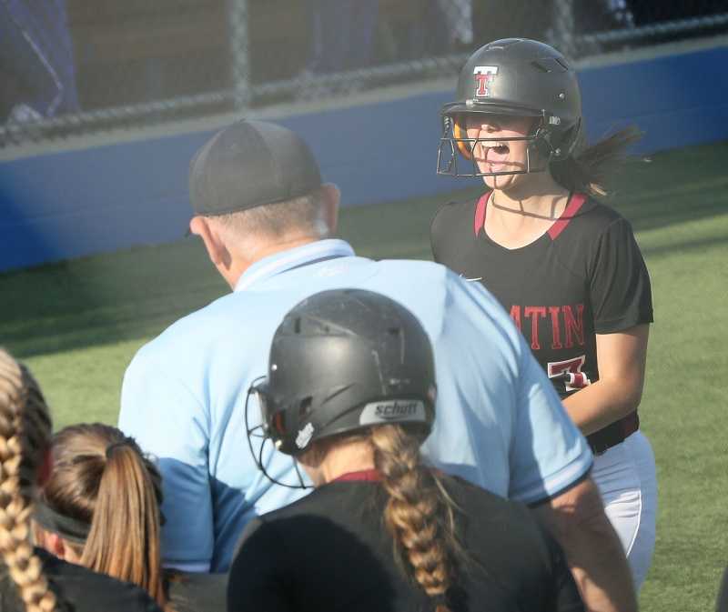 Tualatin's Savannah Braun hit a go-ahead grand slam in the seventh inning of a semifinal at Grants Pass.(Photo by Mark Johansen)