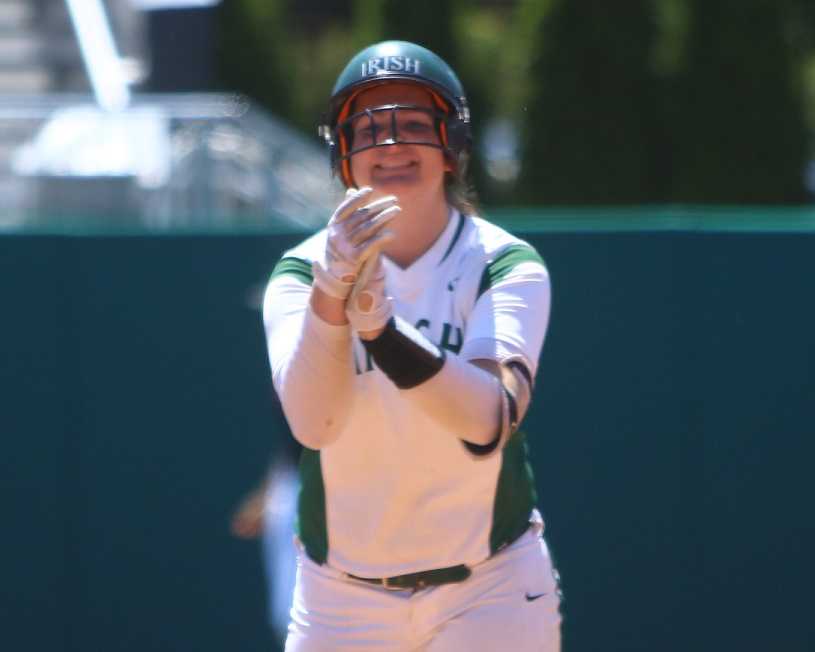 Sheldon's Emma Neuman stands at second base after hitting the go-ahead, three-run double Saturday. (NW Sports Photography)